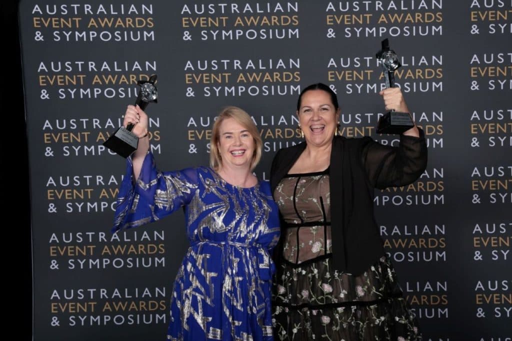 ICMSA team members celebrating with trophies at the Australian Event Awards