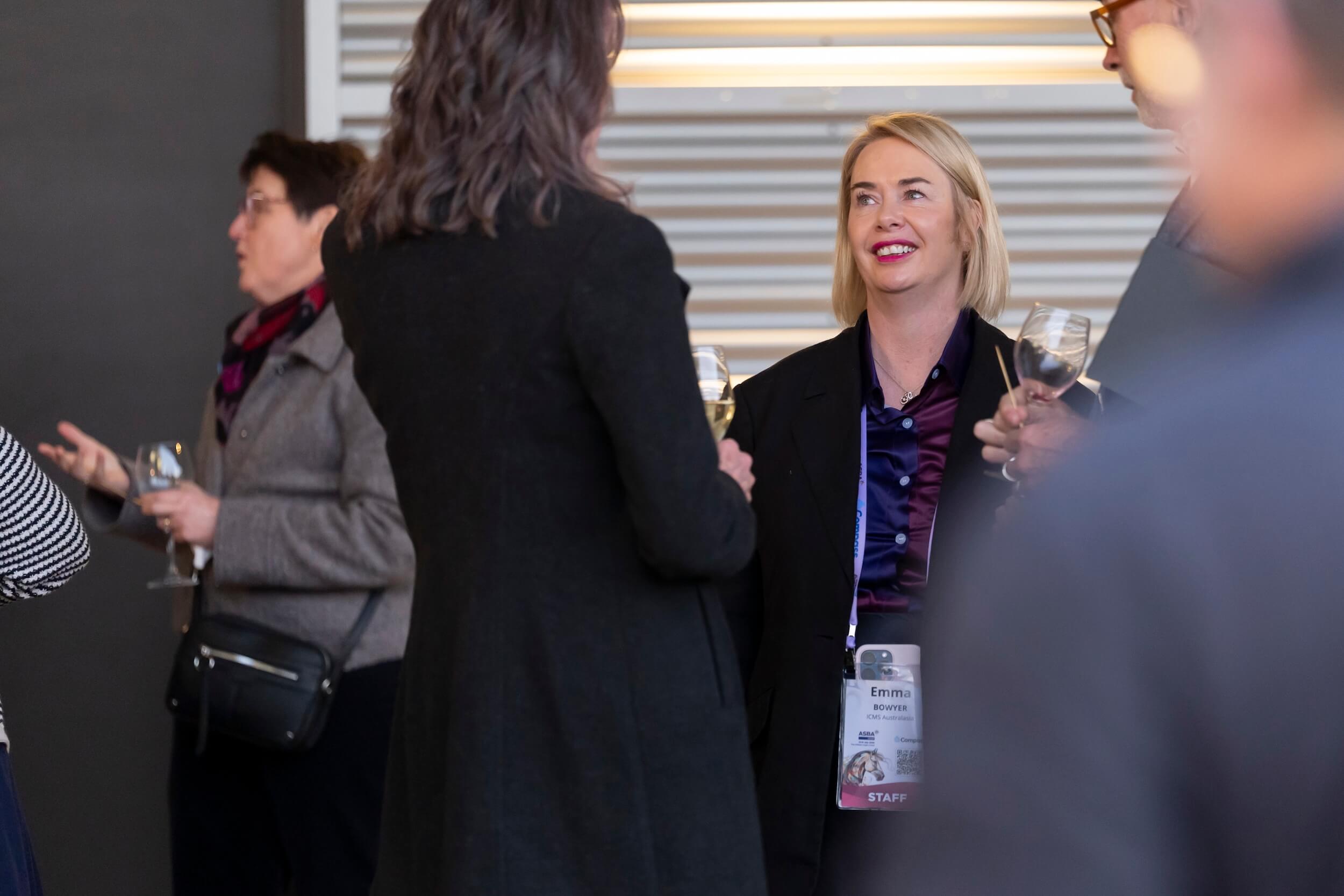 Conference partners and the ICMSA team connecting at an event